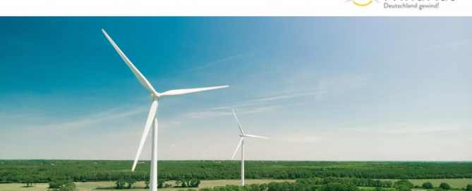 Auf dem Bild sind Windräder zu sehen.